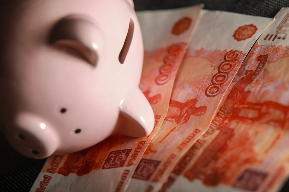 В октябре россияне забрали со своих депозитов в Сбербанке 79 миллиардов рублей. Фото: Максим Стулов/ТАСС
