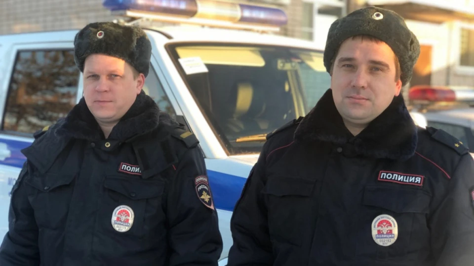 Лейтенант полиции Александр Кокичев и старший сержант Сергей Огурцов