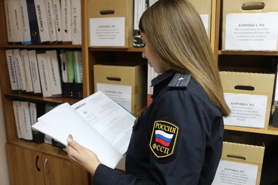 Угольщики выплатили 200 тысяч рублей за смерть кузбассовца. ФОТО: пресс-служба УФССП России по Кемеровской области.