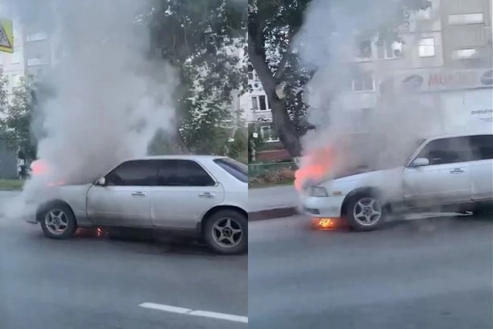 В Новосибирске на улице Дуси Ковальчук загорелась припаркованная у дороги иномарка. Фото: Кадр из видео\"АСТ-54"