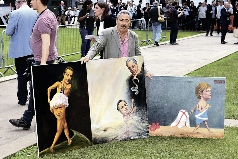 На референдуме в Британии уже зарабатывают уличные художники. Пользуются спросом картины с Кэмероном и Меркель. Фото: PA Wire/Press Association Images/TASS