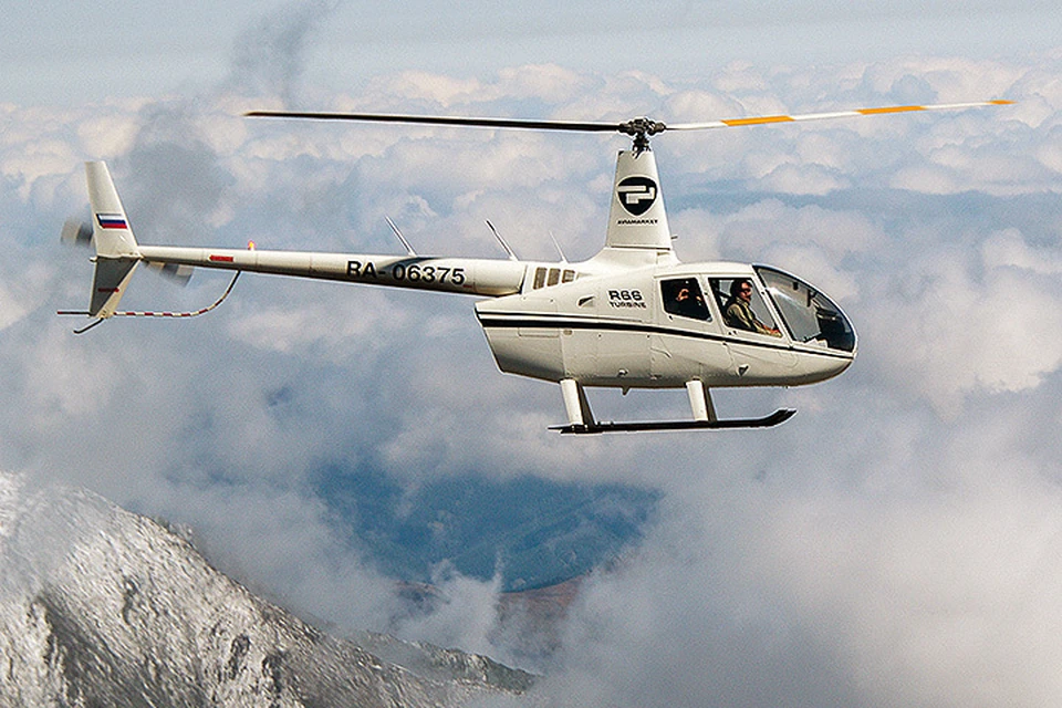Вертолёт Robinson в воздухе. Фото предоставлено пресс- службой вертолетного центра Heli Club